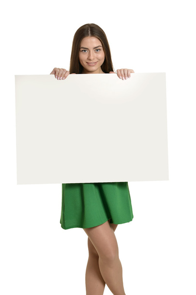 Beautiful woman and white signboard - Fotó, kép