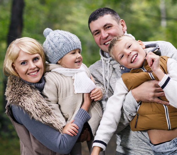 Family in the autumn park - Photo, Image
