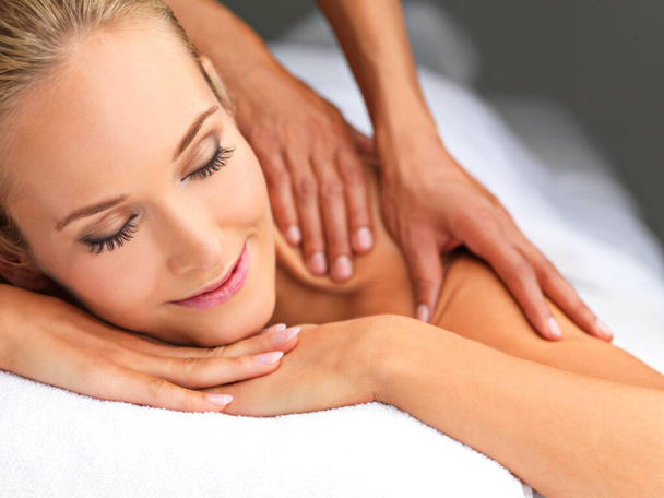 Calm, hands and woman with back massage at spa for wellness, health and self care. Relax, zen and happy female person sleeping with masseuse for body skin treatment or therapy at beauty salon - Photo, Image