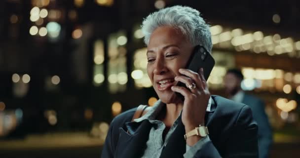 City, night and professional woman with phone call for communication, networking and outdoor chat. Senior CEO, boss or business lawyer talking on her mobile for news, information and travel in bokeh. - Footage, Video