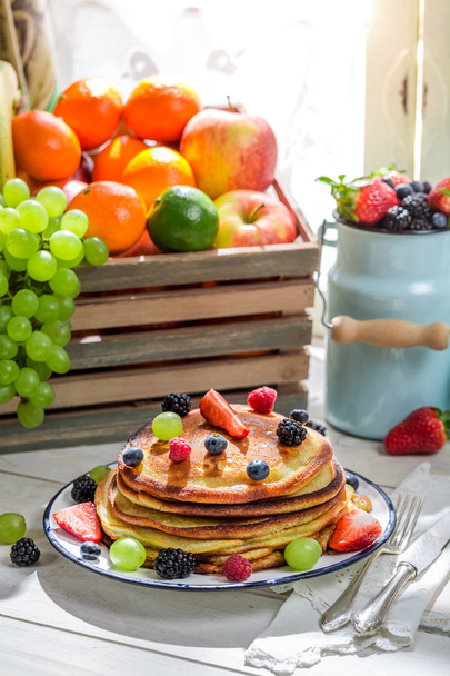Sweet pancakes with fresh fruits - Photo, image