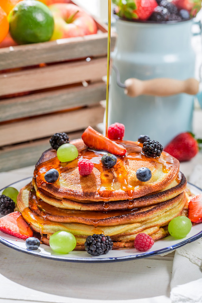 Sweet pancakes with berry fruits - 写真・画像