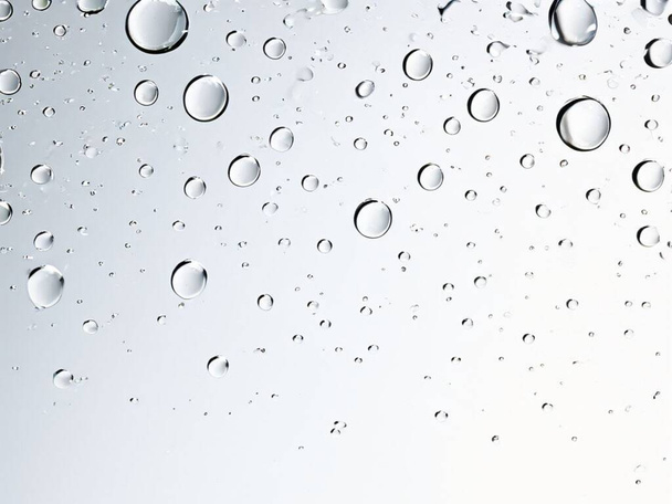 abstrakcyjne tło deszczu, krople na szkło - Zdjęcie, obraz