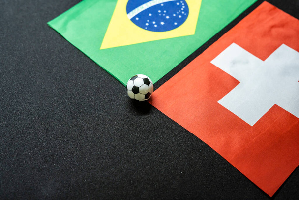 Listopad 2022: Brazylia vs Szwajcaria, Mecz piłki nożnej z flagami narodowymi - Zdjęcie, obraz