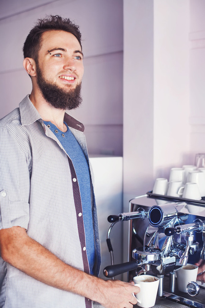 Barista  making coffee in a cafe - Foto, imagen