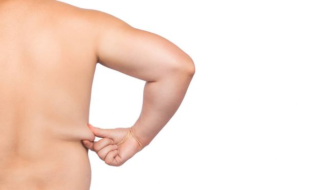 男性は背中と腰に脂肪を示し,減量と健康的なライフスタイルの概念. - 写真・画像