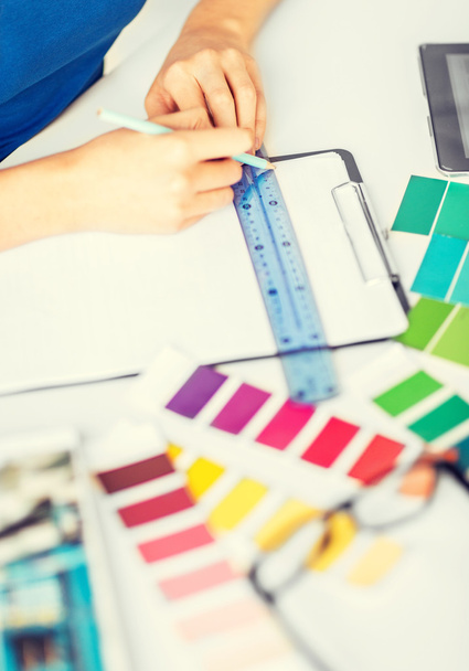 woman working with color samples for selection - Foto, Bild
