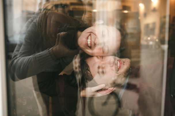 Vintage couple hugs and laughing - Photo, Image