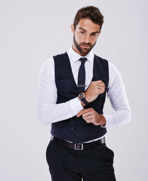 Studio, portrait and gentleman in suit for fashion, stylish and luxury for aesthetic of glamour and classic. Adult, guy and male person in white background, tuxedo and professional for job and career. - Photo, Image