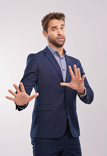 Businessman, hand gesture and studio to refuse or decline business offer with concern on white background. Portrait entrepreneur and reject with move away to deny accusations as corporate person - Photo, Image