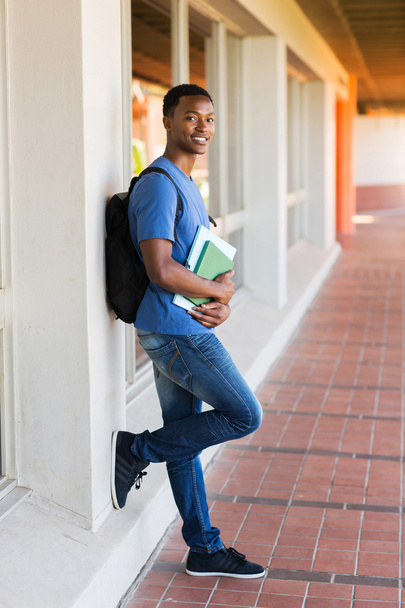 College student leaning against wall - Photo, image