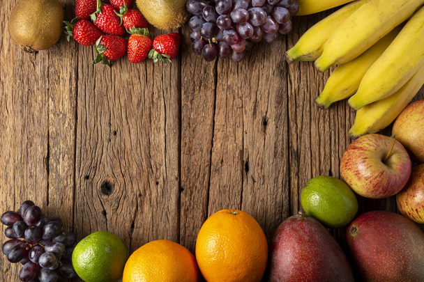 Assortment of fresh fruits on the table. - Photo, Image