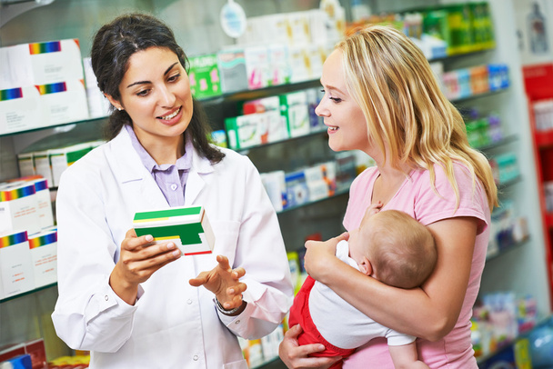 Pharmacy chemist, mother and child in drugstore - Fotó, kép