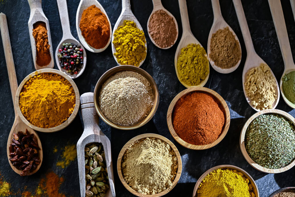 Composition with assortment of spices and herbs. - Photo, Image