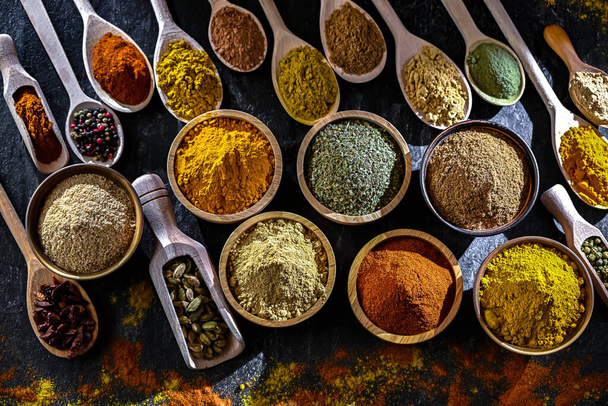 Composition with assortment of spices and herbs. - Photo, Image