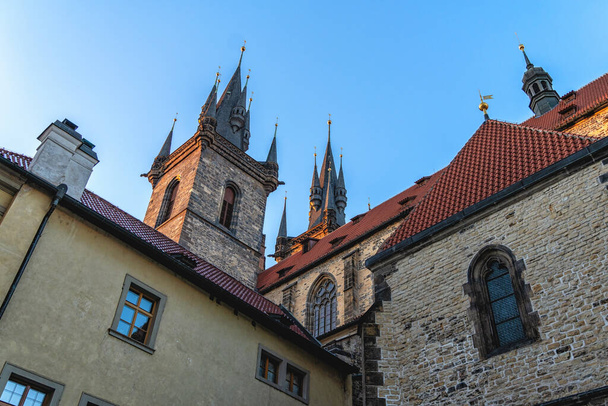 Tyn Church seen from plaza near Stupartska Street in Old Town, Prague, Czech Republic - Photo, Image