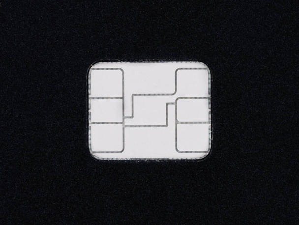 Luottokortin turvasiru lähellä mustaa korttia - Valokuva, kuva