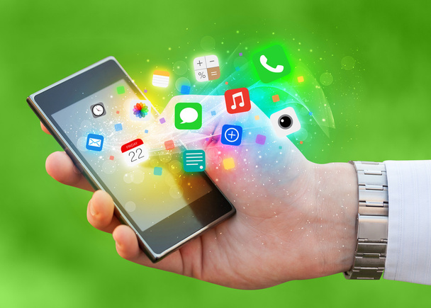 smartphone mano con icone colorate app - Foto, immagini