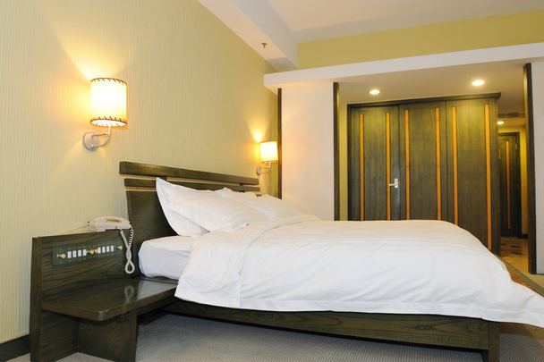 Hotel slaapkamer - Foto, afbeelding