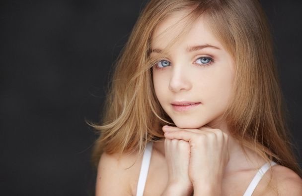 Attractive young girl with blu eyes - Photo, Image