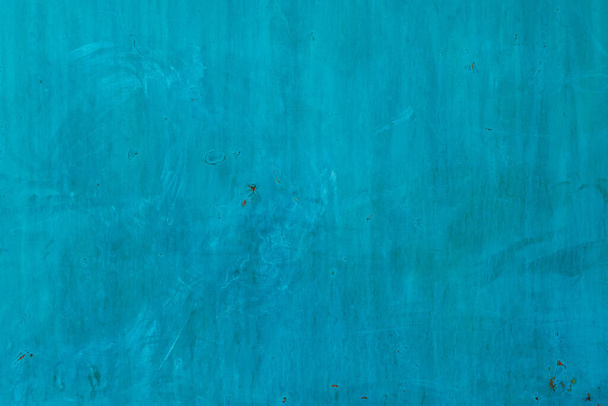 pintura mate turquesa áspera en la superficie plana de chapa - fondo y textura de marco completo. - Foto, imagen