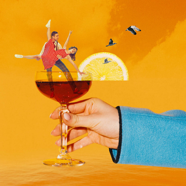 Poster. Contemporary art collage. hand holding glass of alcohol drink where dancing men and woman in retro attire. Textures. Concept of party, fun, nightclub, Friday mood, dance, retro, relaxation. Ad - Photo, Image
