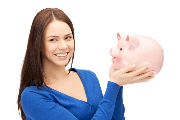 Lovely woman with piggy bank - Foto, Bild