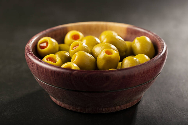 Stuffed green olives in a bowl. - Photo, Image