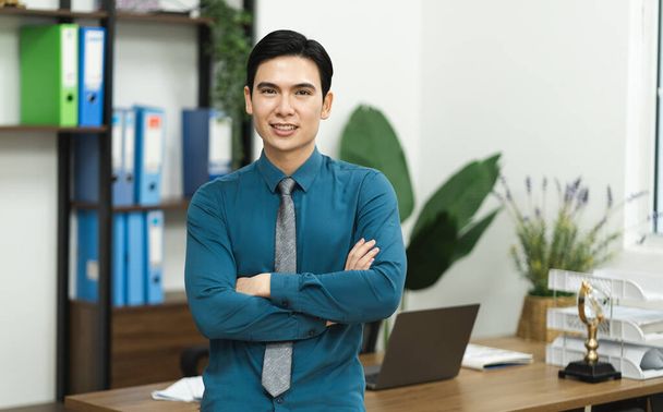 Image of Asian male businessman working in the office - Photo, Image