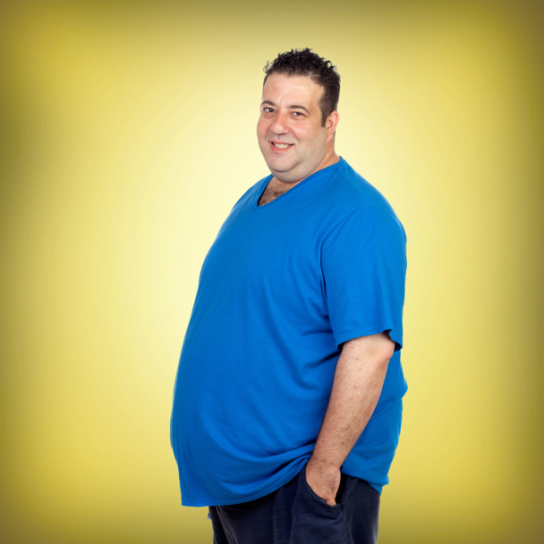 Hombre gordo feliz con camisa azul
 - Foto, imagen