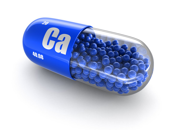 Vitamin capsule Ca (clipping path included). - Foto, afbeelding