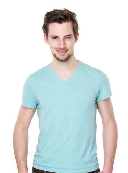 Белый красивый мужчина в бирюзовой футболке
 - Фото, изображение