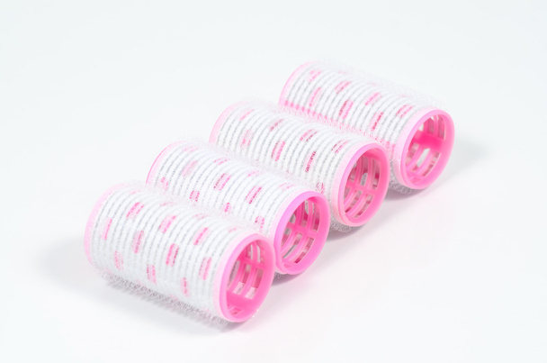 Pink hair curlers with hairpin isolated on white background  - Photo, Image