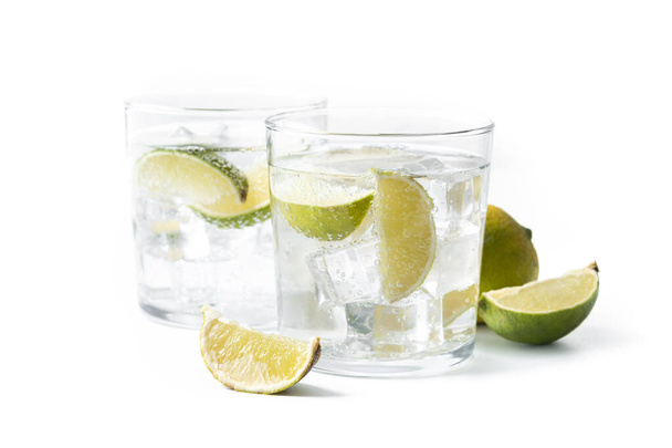 Glass of vodka tonic cocktail isolated on white background. - Photo, Image