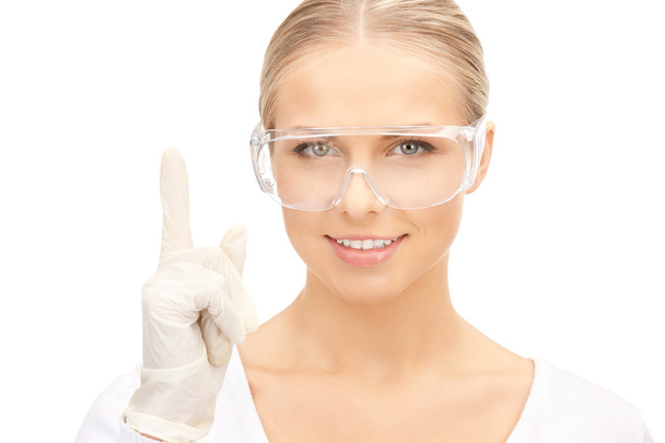 Woman in protective glasses and gloves - Fotoğraf, Görsel