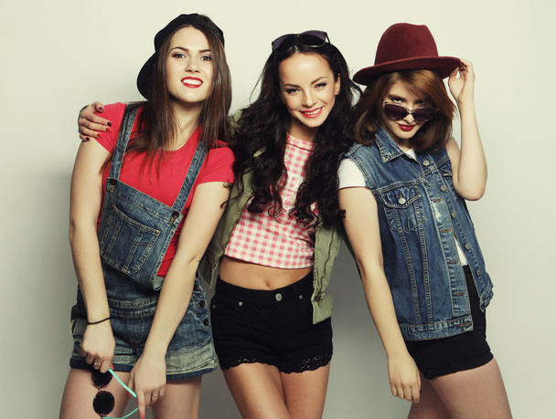 Three stylish sexy hipster girls best friends. - Zdjęcie, obraz
