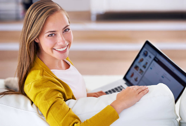 Portrait, happy and woman with laptop in living room for relax, social media or communication in apartment. Smile, face and female person for internet search, networking or typing on computer - Photo, Image