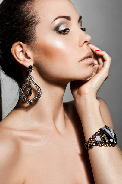 Elegant fashionable woman with silver jewelry - Photo, Image
