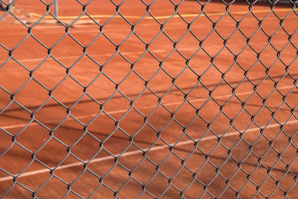 Поверхность теннисного корта из красной глины - Фото, изображение