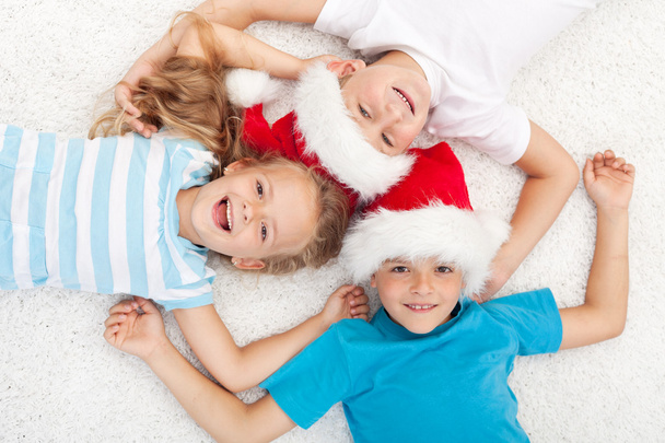 Niños felices en Navidad
 - Foto, Imagen