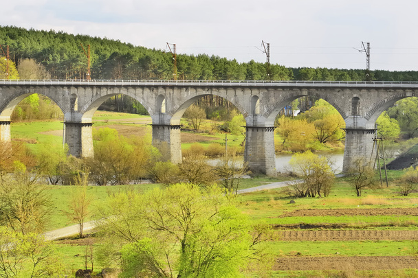 Railway bridge over the river - Foto, afbeelding