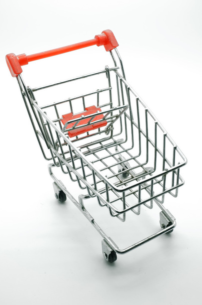 Empty shopping cart, side view, on white background. - Zdjęcie, obraz