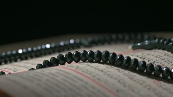 Religion The Book Of Islam Quran And Rosary Beads - Footage, Video