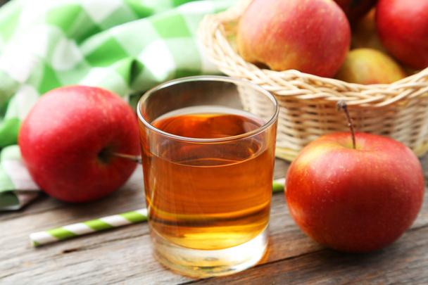 Glass of apple juice with apples - Photo, image