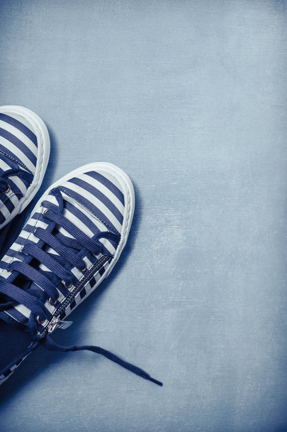 Stripe Sneakers wooden background - Photo, Image