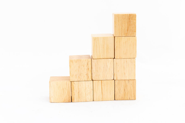 Wooden cube stack isolates on white background. Blank wooden block with space for text. - Photo, Image