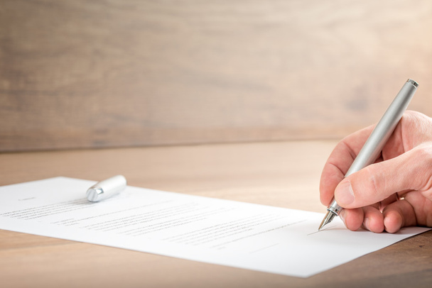 Close up Businessman Signing a Contract Document - Photo, Image