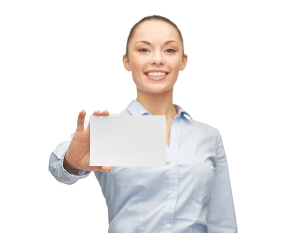 smiling businesswoman showing white blank card - Фото, изображение