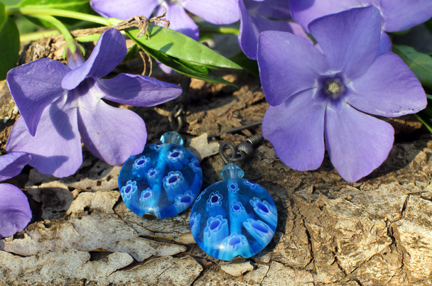 Handmade glass earrings on the nature background - Photo, Image