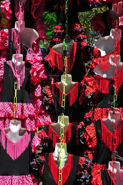 typical dot-patterned flamenco dresses on sale in a street marke - Photo, Image